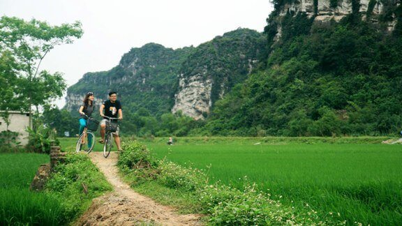 Balade à vélo au milieu des rizières et montagnes